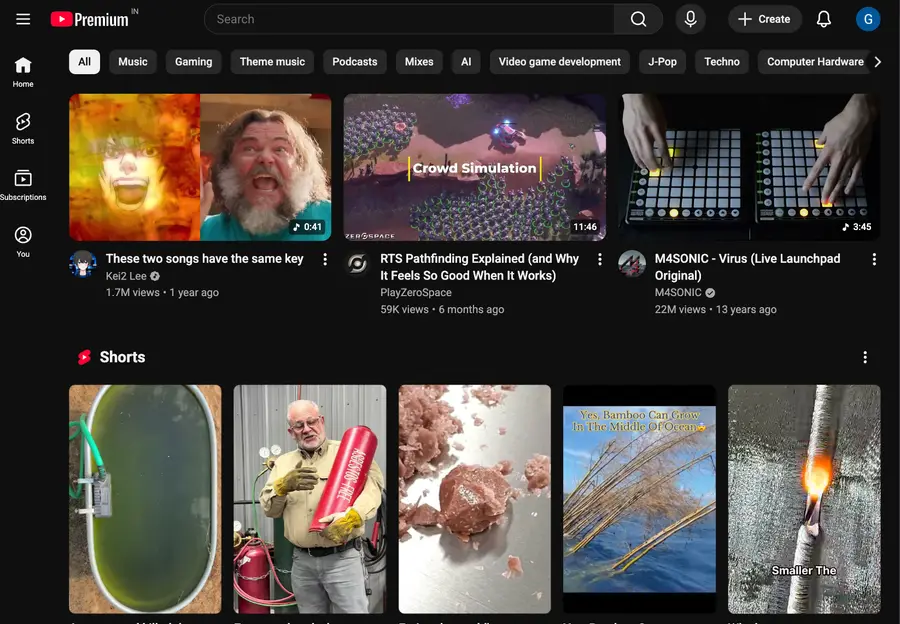 YouTube default layout with recommendations, Shorts shelf, and autoplay